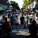 Patrons walk through the intersection of Main and Liberty streets during the Mayor's Green Fair on Friday, June 14. Daniel Brenner I AnnArbor.com